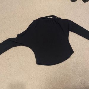 Black sweater. "Fuji thermal" from Free People. We The Free brand.